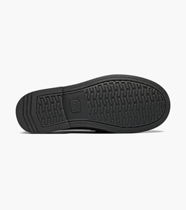 Croquet Penny Loafer in black viewing the sole